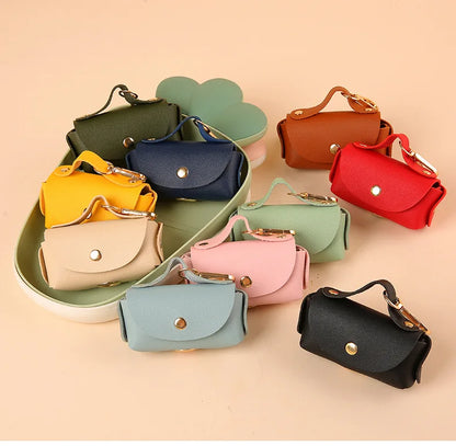 Portable pet poop bag dispenser